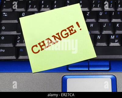 Memo note on notebook, Change ! Stock Photo