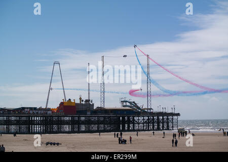 Blackpool, UK. 25th May, 2015. Red arrows perform along south beach in Blackpool this afternoon.The show is a welcome boost for the resort as the vistors turn up in vast numbers to see the air show Credit: Gary Telford/Alamy live news Stock Photo