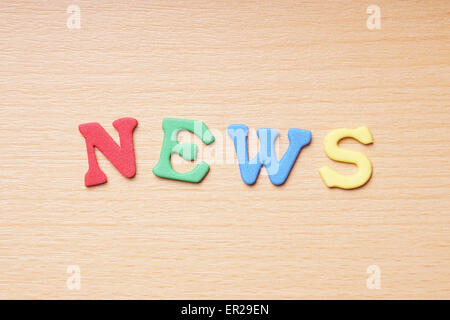 news in foam rubber letters Stock Photo