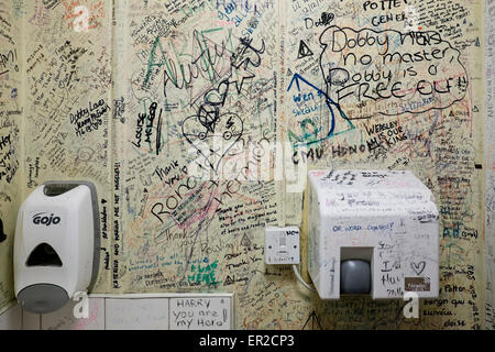 The Elephant House is famous as the place where  J.K. Rowling, started writing her early novels in the back room overlooking Edinburgh Castle. The bathrooms are have become a sort of graffiti shrine with thousands of marks, lines and comments made by visitors. Picture by Julie Edwards on 21/05/2015. Stock Photo