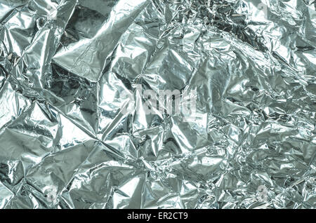 crumpled aluminum foil background texture Stock Photo
