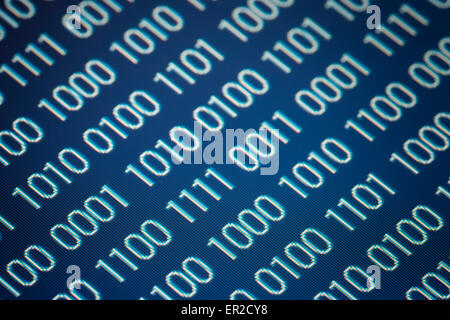 close up of binary code on a blue background Stock Photo