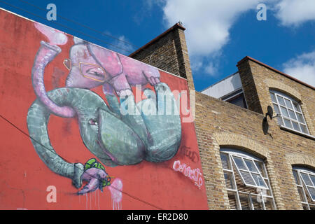 Street art by Cernesto in Grimsby Street, Shoreditch, East London, England. Stock Photo