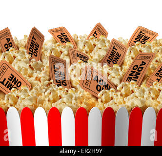 Movie popcorn tickets border as a group of popped corn snacks with cinema ticket stubs in the food as a theatrical symbol for en Stock Photo