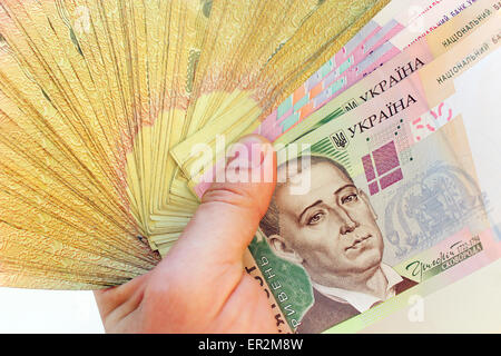 Ukrainian money of value 100 in the hand Stock Photo