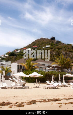 The Cheval Blanc St-Barth Isle de France hotel and beach club on Flamands Beach in St. Barts, with Colombier hills Stock Photo