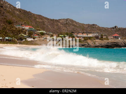 Ocean waves rolling against Flamands Beach in St. Barts Stock Photo