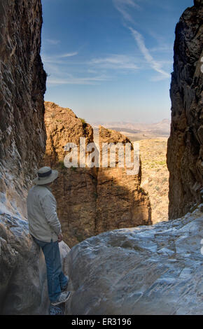 Hiker at The Window with its view of Chihuahuan Desert from Chisos Mountains at Big Bend National Park, Texas, USA Stock Photo