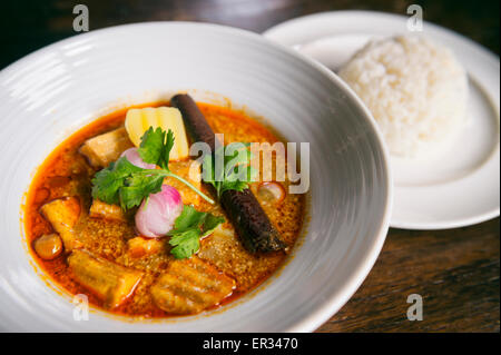 traditional-thai-green-curry-garnished-with-fresh-sweet-basil-leaves