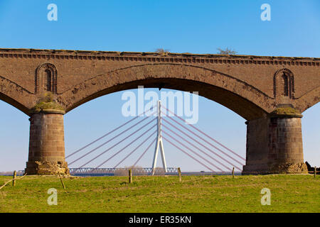 Europe, Germany, North Rhine-Westphalia, Wesel, the Niederrhein bridge across the river Rhine and the old railway bridge which w Stock Photo