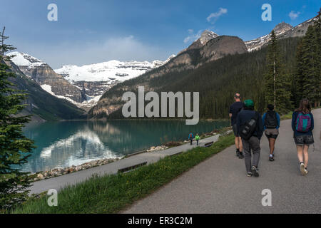 Family hiking, Lake Louise, Banff National Park, Alberta, Canada Stock Photo