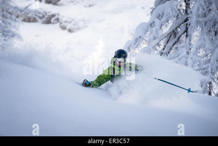 Man deep powder skiing in Austria Stock Photo