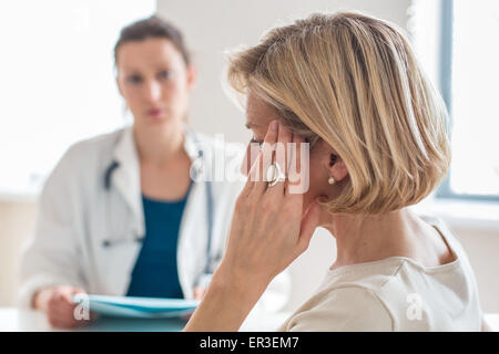 Woman suffering from headache. Stock Photo