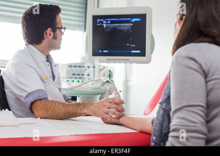 Ultrasound carpal tunnel by a rheumatologist, Bordeaux hospital. Stock Photo