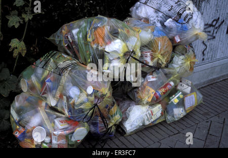 DEU, Germany, Mecklenburg-Western Pomerania, Zingst, yellow garbage bags with recyclable garbage.  DEU, Deutschland, Mecklenburg Stock Photo
