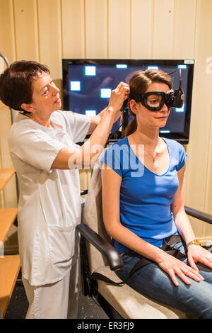 Electronystagmography, eye examination for vertigo screening, Limoges hospital, France. Stock Photo