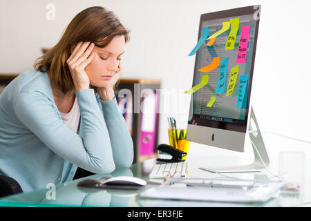 Stressed woman at work. Stock Photo