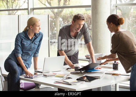 Colleagues collaborating on project Stock Photo
