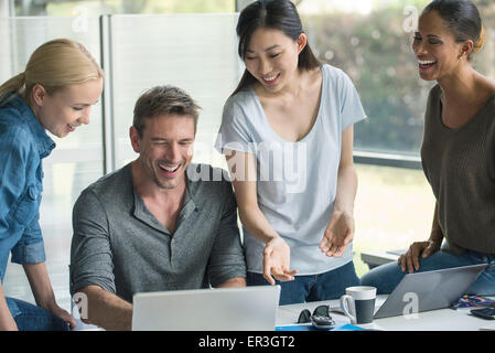 Colleagues collaborating on project Stock Photo