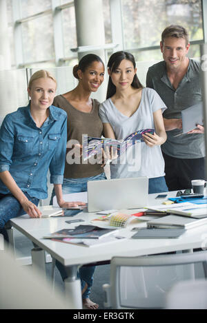 Group projects build employee morale Stock Photo