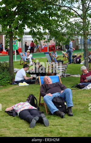 Hay Festival, Powys, Wales - May 2015  - The festival lawns provide a great place to sit and relax in the fine weather. The literary festival has many sessions and events by authors and  writers. Stock Photo