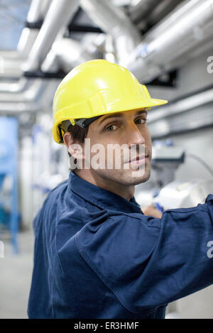 Worker at work in factory Stock Photo