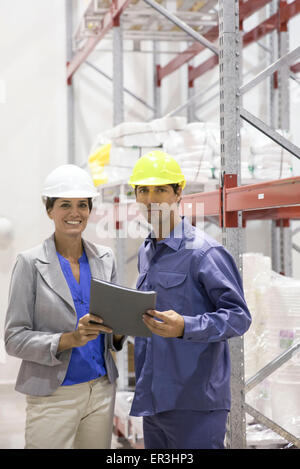 Engineers in warehouse, portrait Stock Photo