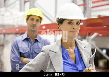 Female supervisor at industrial site, portrait Stock Photo