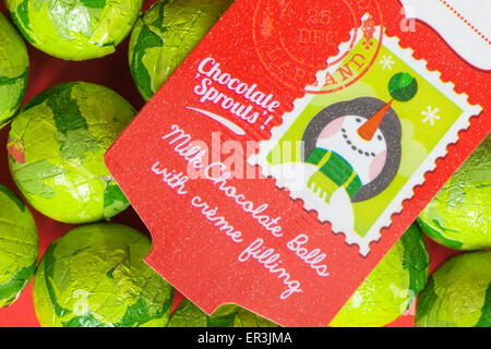 Christmas foil wrapped chocolate sprouts - milk chocolate balls with creme filling ready for Christmas Stock Photo