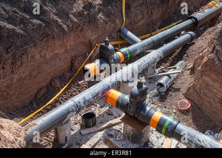 Laying underground pipeline Stock Photo