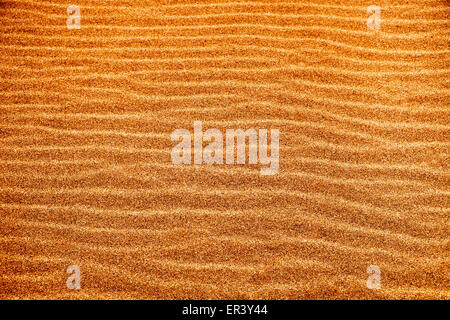 closeup of a sand background with a natural wavy pattern Stock Photo