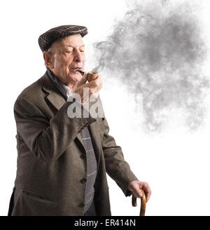 Old man smoking pipe Stock Photo