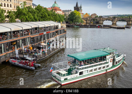 Floating boat restaurant in old town on river Vltava central Prague, Czech Republic,  Europe Stock Photo