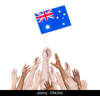 Human hand holding Australia flag among multi-ethnic group of people's hand