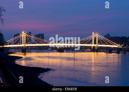 Albert Bridge at night and River Thames Chelsea London England UK Stock Photo