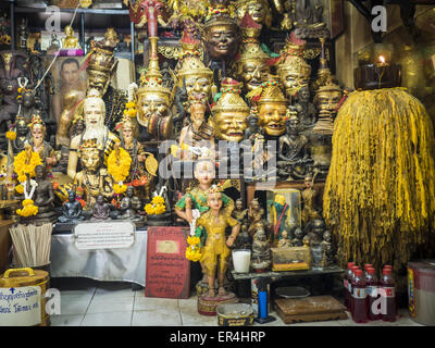 Bangkok, Bangkok, Thailand. 25th May, 2015. The shrine in Ajarn Neng Onnut's (also known as Khun Pean) Sak Yant tattoo parlor. Sak Yant (Thai for ''tattoos of mystical drawings'' sak=tattoo, yantra=mystical drawing) tattoos are popular throughout Thailand, Cambodia, Laos and Myanmar. The tattoos are believed to impart magical powers to the people who have them. People get the tattoos to address specific needs. For example, a business person would get a tattoo to make his business successful, and a soldier would get a tattoo to help him in battle. The tattoos are blessed by monks or people who Stock Photo