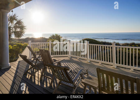 Deck Chairs Outside Deck Patio With Sunshine & Palm Tree, Hilton Head Beach, South Carolina USA Stock Photo