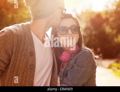 Loving young couple in sunlight. Krakow, Poland Stock Photo