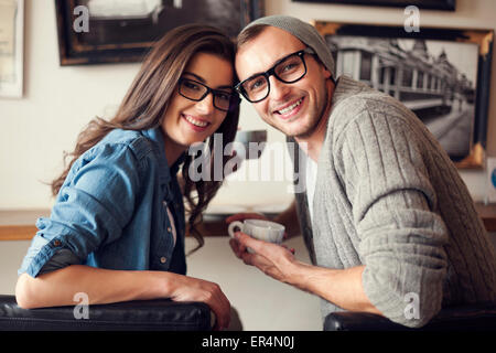 Portrait of smiling couple at cafe. Krakow, Poland Stock Photo