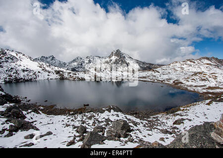 Gosaikunda - a frozen lake high up in Himalayas, in Nepal's Langtang National Park Stock Photo