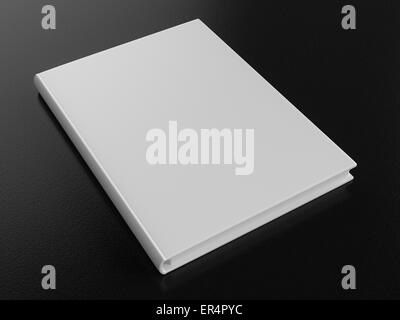 Single blank white book on a dark rough background. Stock Photo