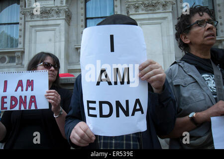 London, UK. 27th May 2015. A group of protesters held  placards outside Downing Street to protect whistleblowers who were prosecuted for informing  on an elderly woman named Edna who was abused  whilst in care Credit:  amer ghazzal/Alamy Live News