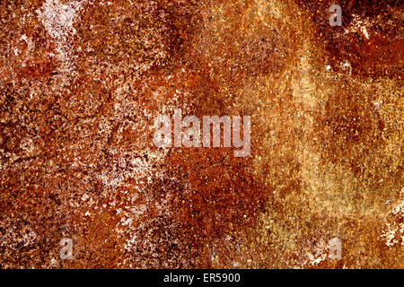 closeup of a yellow and brown rusty surface Stock Photo