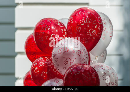 Red and white balloons with hearts, Hamburg, Germany Stock Photo