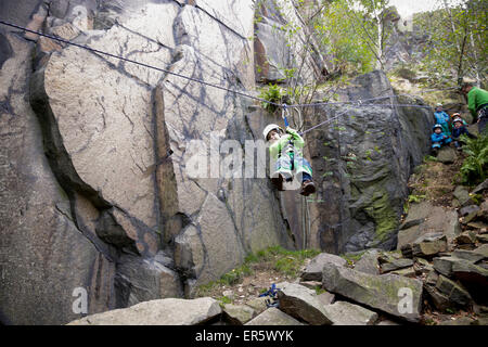 Boy 4 years zip-lining, Gaudlitzberg stone pit, Roecknitz, Thallwitz, Saxony, Germany Stock Photo