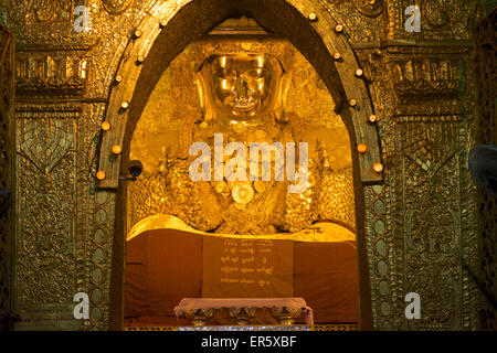 Mahamuni Statue in the Mahamuni pagoda at Mandalay, Myanmar, Burma Stock Photo