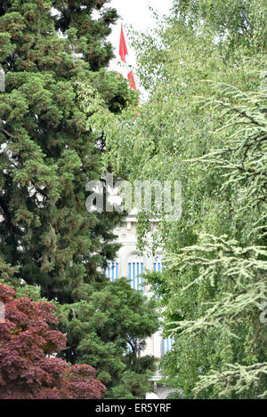 Zurich, Switzerland. 27th May, 2015. Terrasse and facade of star hotel Baur Au Lac in Zurich seen through the hotel's idyllic litte park near the lake. Credit:  thamerpic/Alamy Live News Stock Photo