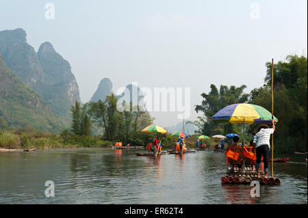 Bamboo rafts, karst mountains, River Yulong River, Jin Xiang, Yangshuo, near Guilin, Guanxi Autonomous Region Stock Photo