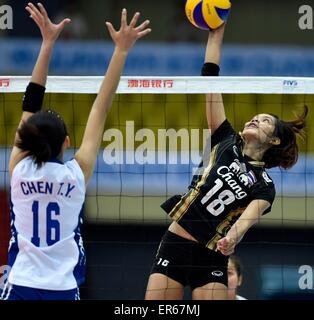 Tianjin, China. 28th May, 2015. Ajcharaporn (R) of Thailand spikes the ball during the bronze medal match against Chinese Taipei at the 18th Asian Senior Women's Volleyball Championships in Tianjin, north China, May 28, 2015. Thailand won 3-0. © Yue Yuewei/Xinhua/Alamy Live News Stock Photo