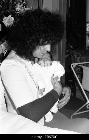 Marc Bolan with girlfriend Gloria Jones and their baby son, Rolan Bolan - born 26th September - pictured 1st October 1975. Stock Photo